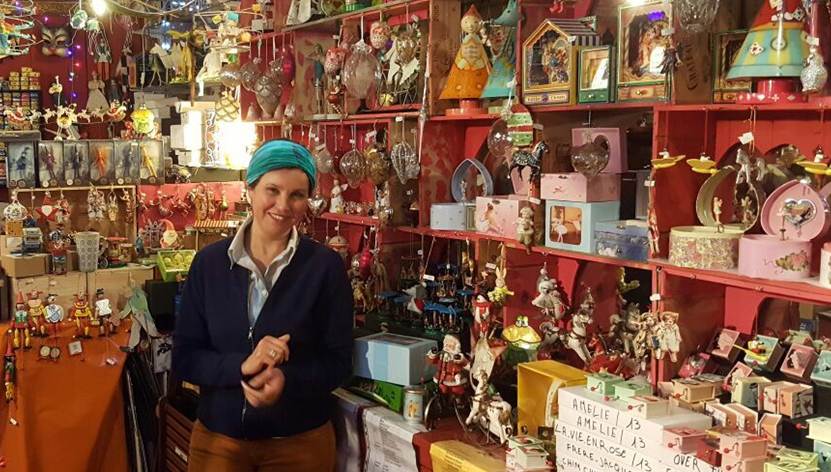 A person standing in a shop

Description automatically generated with medium confidence