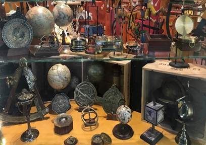 A picture containing indoor, old, antique, cluttered

Description automatically generated