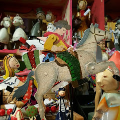 A picture containing indoor, stuffed, cluttered, several

Description automatically generated